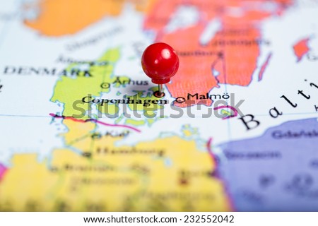 Map of Europe with a round red push pin placed on the city of Copenhagen