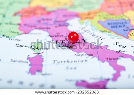 Map of Europe with a round red push pin placed on the city of Rome