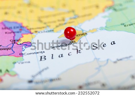 Map of Europe with a round red push pin placed on the city of Sevastopol on Crimea