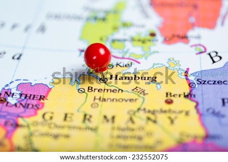 Map of Europe with a round red push pin placed on the city of Hamburg