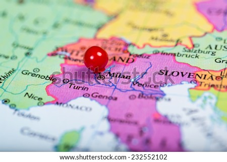 Map of Europe with a round red push pin placed on the city of Milan