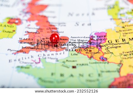Map of Europe with a round red push pin placed on the city of London