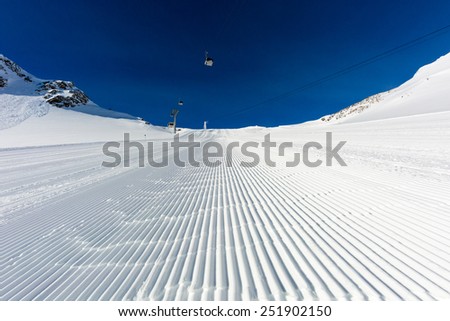 Well groomed ski run during winter time on the Tiefenbach glacier in Soelden, Austria.