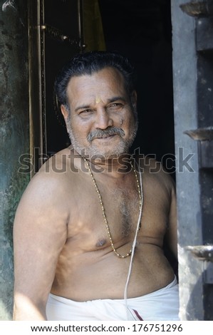 FORT KOCHI,INDIA-NOVEMBER 23 : Portrait of unidentified priest during Sree Poornathrayesa temple festival, Thrippunithura, Kerala, India on November 23, 2011