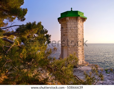 The old stone lighthouse, still in use somewhere on the Adriatic coast.
