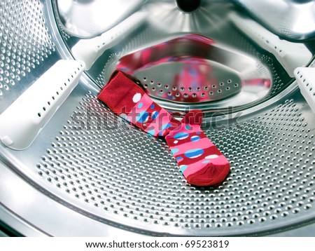 Do not forget the red or colorful  sock in a washing machine!