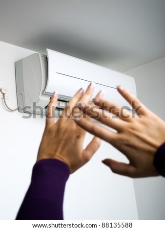 Conceptual view about health problems caused by exposure to an air conditioner. - stock photo