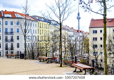 Berlin real estate panorama with historic buildings and park in foreground. Famous travel spot