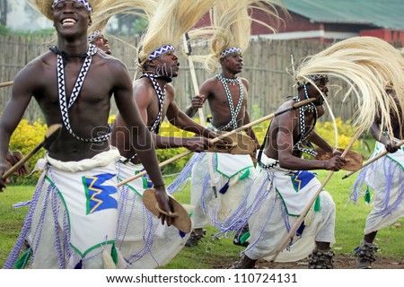 Musanze, Rwanda - June 16: Tribal Dancers Of The Batwa Tribe Perform Traditional Intore Dance To Celebrate The Birth Of An Endangered Mountain Gorilla On June 16, 2012 In Musanze, Rwanda.