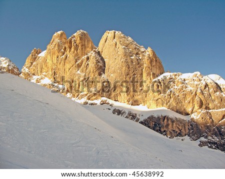 Yellow-pink mountains at a sunset - the Italian Alpes