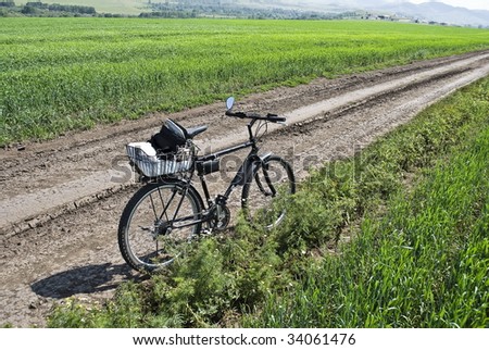 Old bicycle on road