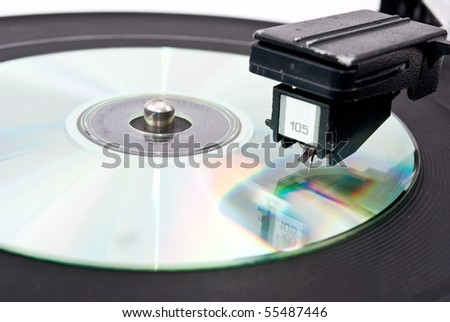 Vinyl player and compact disk