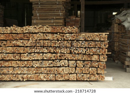 Stacked of wood in wood warehouse.