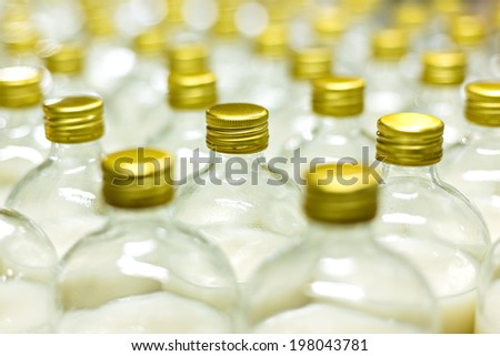 Glass bottles with gold caps