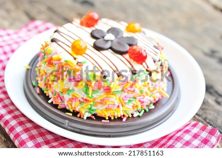 Colorful cake frosting with sugar sprinkles