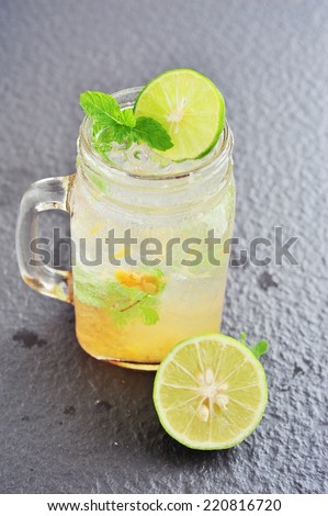 lemon juice mix with plum juice of bottle glass.
