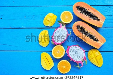 Fresh fruits.Mixed fruits on blue wood background.Healthy eating, dieting.