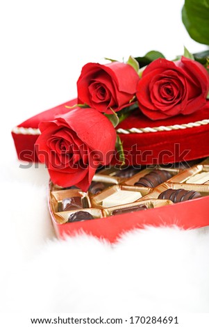 Valentine: Holiday flower and candy gifts.