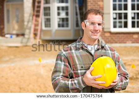 Construction: Builder Wearing Safety Glasses.