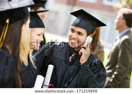 Graduation: Happy Hispanic Student Calling Friends After Graduation