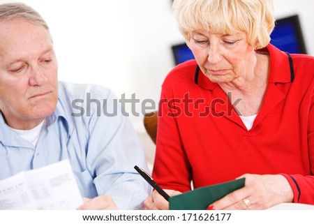 Seniors: Writing Checks For Monthly Bills