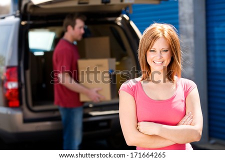Storage: Cheerful Woman Ready To Help Empty Truck