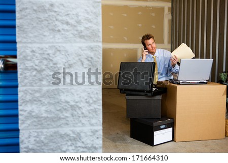 Storage: Businessman Uses Storage Unit As Office