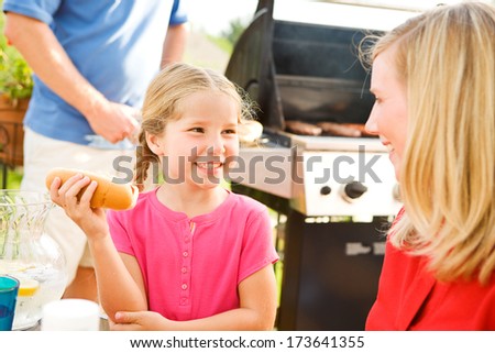 July 4th: Little Girl With Hot Dog For DInner