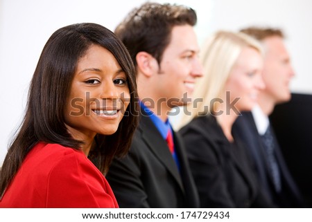 Business: Smiling Woman During Meeting