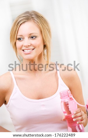Pink: Pink Ribbon Woman Taking A Drink During Workout