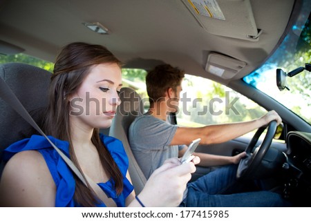 Teens: Girl Texting While Friend Drives