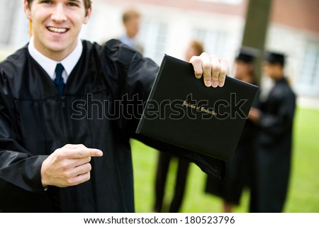 Graduation: Male Student Excited About DIploma