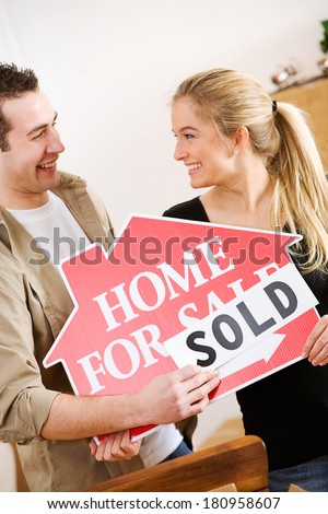 Moving: Man Puts Sold On Home Sale Sign