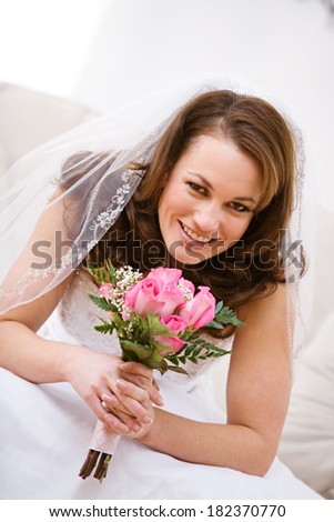 Bride: Smiling Woman With Bridal Bouquet