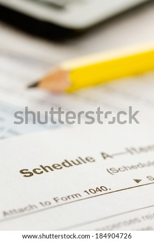 Taxes: Pencil and Schedule A From United States Tax Forms