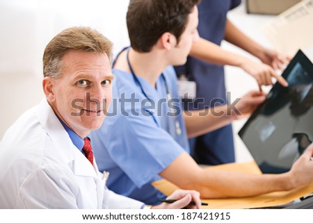 Doctor: Doctors Consult Together On Xray