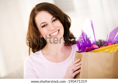 Pink: Woman Carrying In Groceries