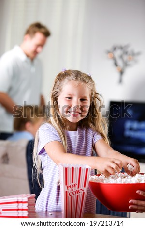 Family: Smiling Girl At Family Movie Night