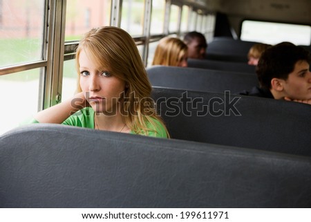 School Bus: Serious Teens Rides Bus To School
