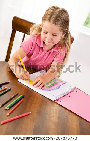 School: Girl Coloring Rainbow In Notebook With Colored Pencils