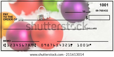 Blank Check With Christmas Ornament Background.  Fake Numbers For Account Information.