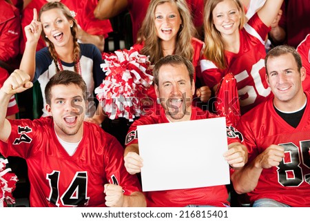 Fans: Football Fan Holds Up Blank Sign While Cheering