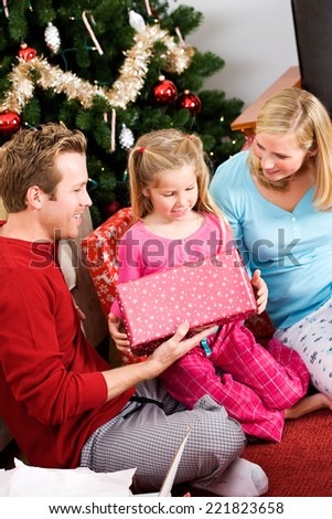Holidays: Little Girl Gets Christmas Gift From Parents