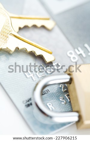 Credit Card With Keys And Padlock On Top