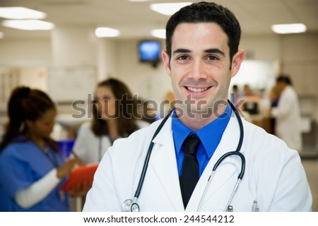 Hospital: Cheerful Male Physician In Emergency Ward
