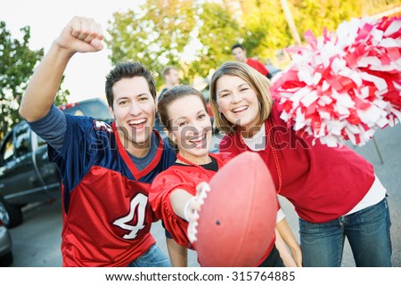 Tailgating: Three Friends Cheer For Favorite Team