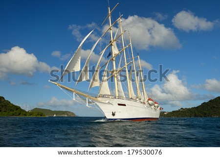 Sailing ship on the background of the beautiful sky and clouds. Collection of boats, ships and yachts
