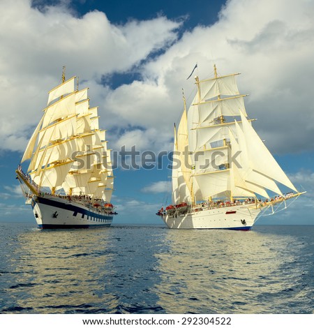 Sailing ship with beautiful cloudless sky. Sailing. Luxury yacht.