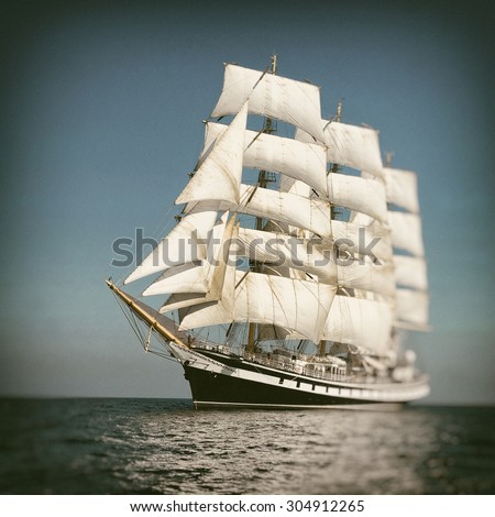 Sailing ship.  Toned image and blur. Retro style postcard. Sailing. Yachting.\
Travel