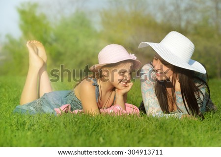 Happy mother and child girl, Outdoor in the sun. Family. Real emotions